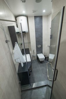 Ванная комната в номере Сидней в отеле 12th Floor Apartments в Одессе