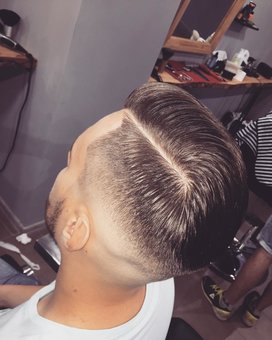 Men's haircuts at the KingsMan barbershop in Zaporozhye. Sign up for a discount.
