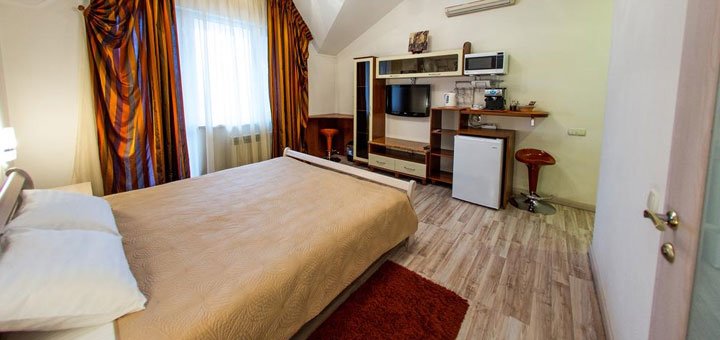 Номер в отеле «ABC Apartments Business Class Kiev» в Киеве. Забронировать номер со скидкой. Отели в Киеве.
