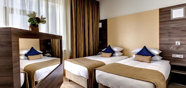 Номер в отеле «Ramada Encore» в Киеве. Забронировать номер со скидкой. 