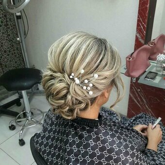 Evening hairstyle in the beauty salon victoria slavyansk. sign up for an evening hairstyle for the promotion