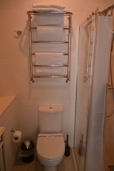 A bathroom in the room of the Michelle hotel in Odessa. Book a room at a discount.